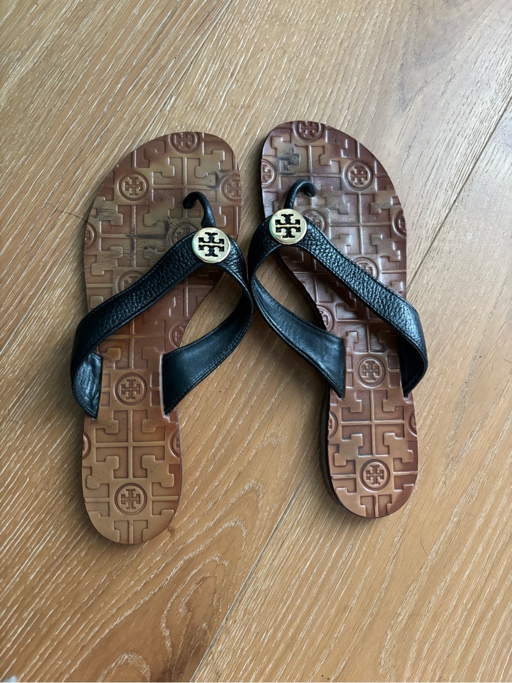 Tory Burch Black Leather Flip-Flop Sandals with Gold Logo